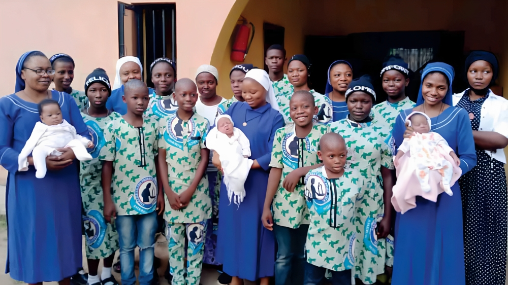 Children and caregivers at Anawim Homes